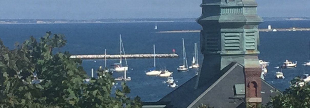 Town Hall steeple with Provincetown harbor in background