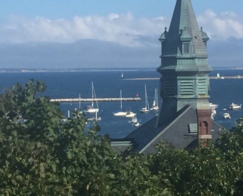 Town Hall steeple with Provincetown harbor in background